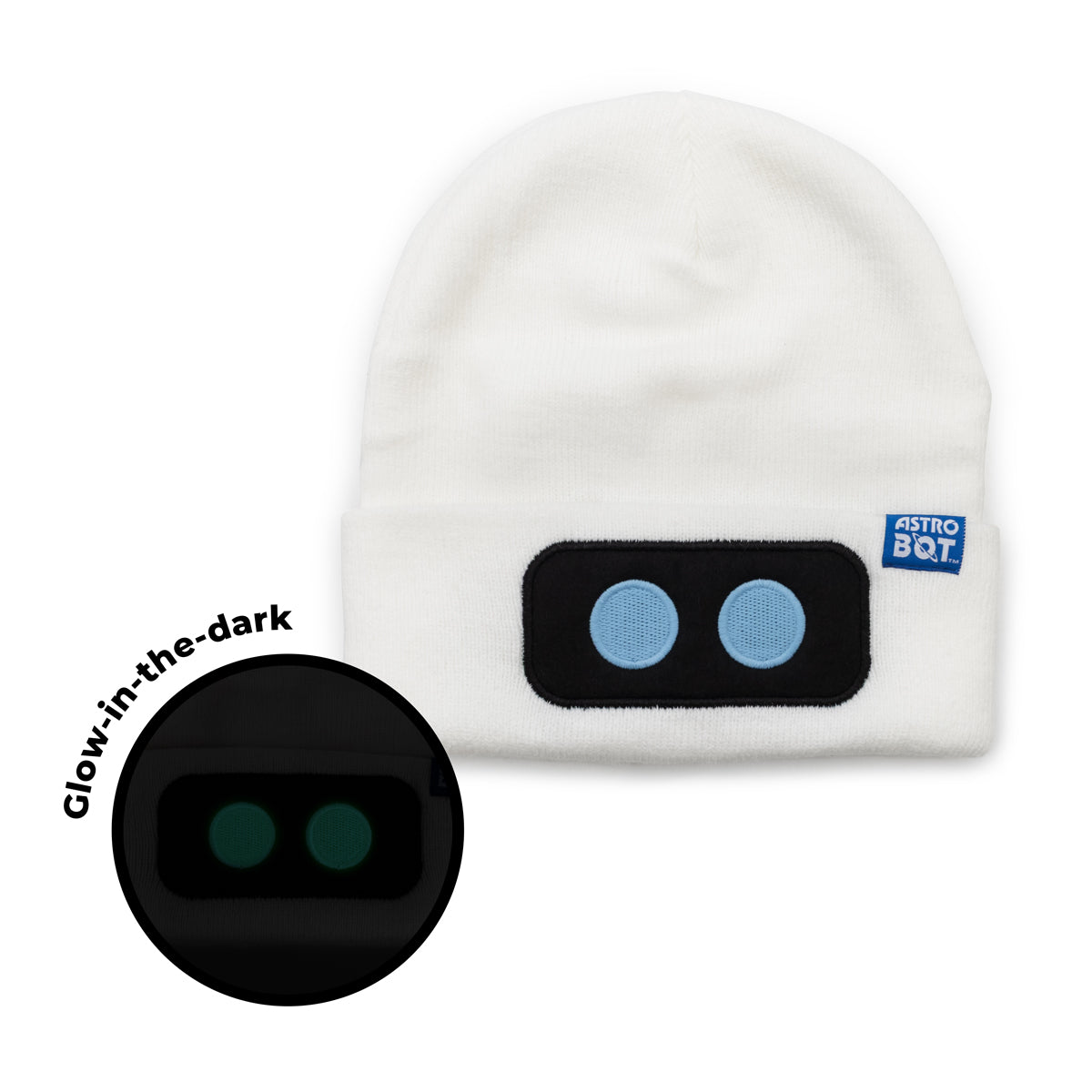 White beanie with robot design and 'Astro Bot' branding, featuring glow-in-the-dark elements.