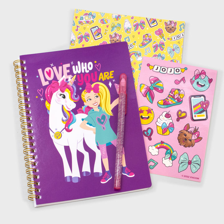 jojo siwa scrapbook set. includes: notebook, stickers, craft paper, pen. image on notebook: jojo with unicorn. text: love who you are. stickers: smiley face, phone, sneaker, bow, bowbow, cupcake, rainbow, letters that say jojo. craft paper: phone, ice cream truck, ice cream cone, bows, sneakers, letters that say jojo, bowbow.