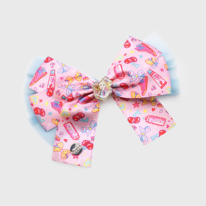 jojo siwa box bow. image on bow: pattern of water bottle, cherries, bows, hearts, stars, and diamonds. charm of jojo and bowbow in middle of bow.