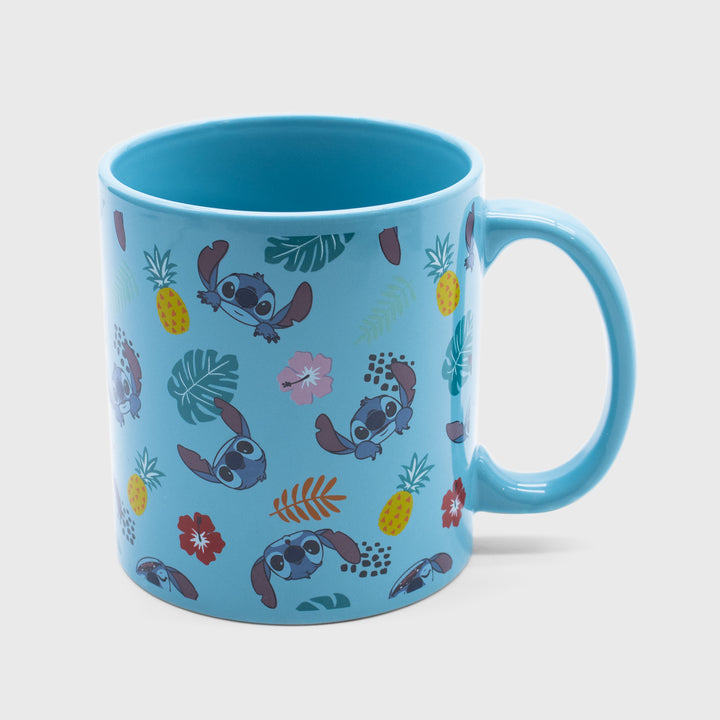 stitch mug. pattern: stitch's face, hawaiian flowers, pineapples.