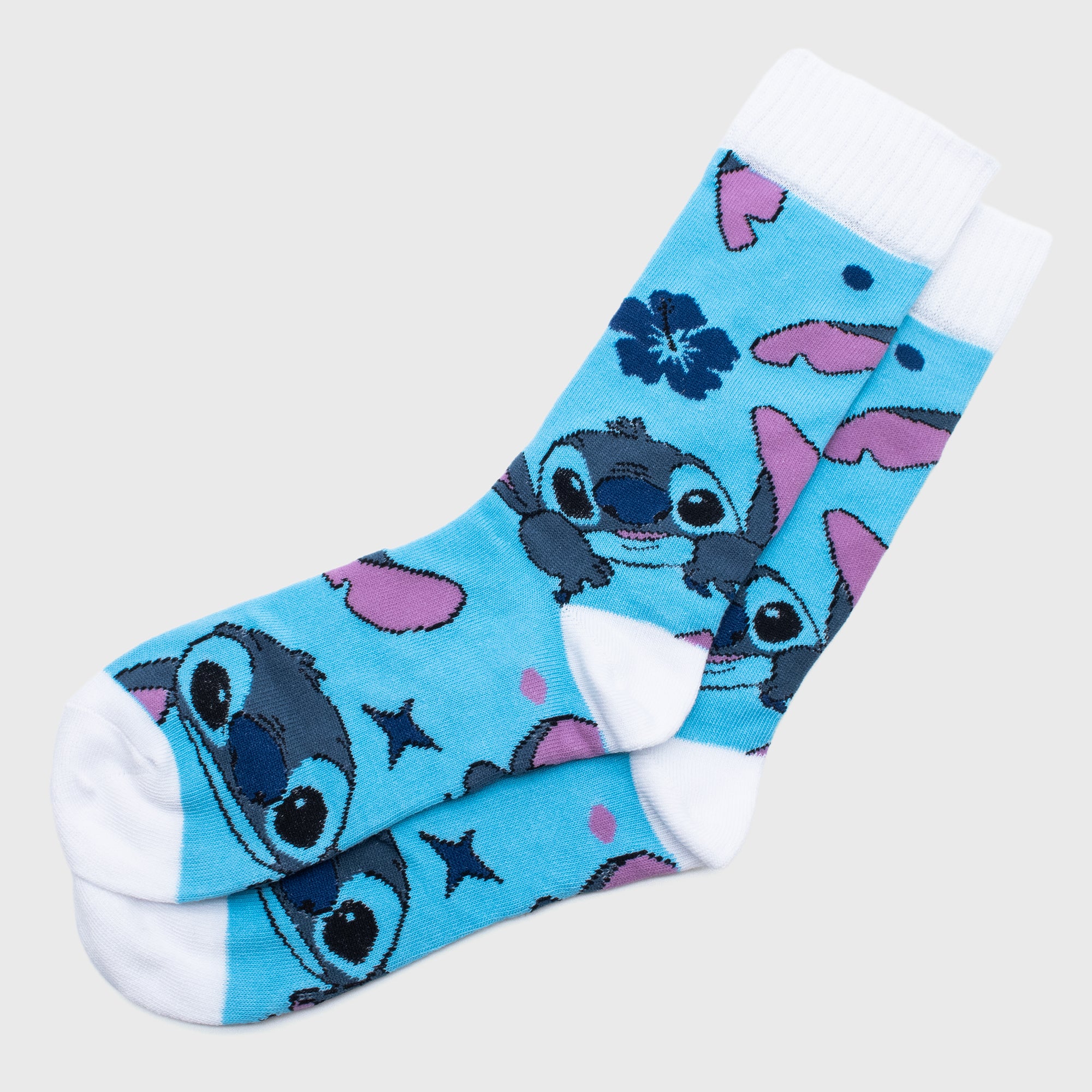stitch crew socks. pattern: circles, stars, hawaiian flowers, stitch's face.