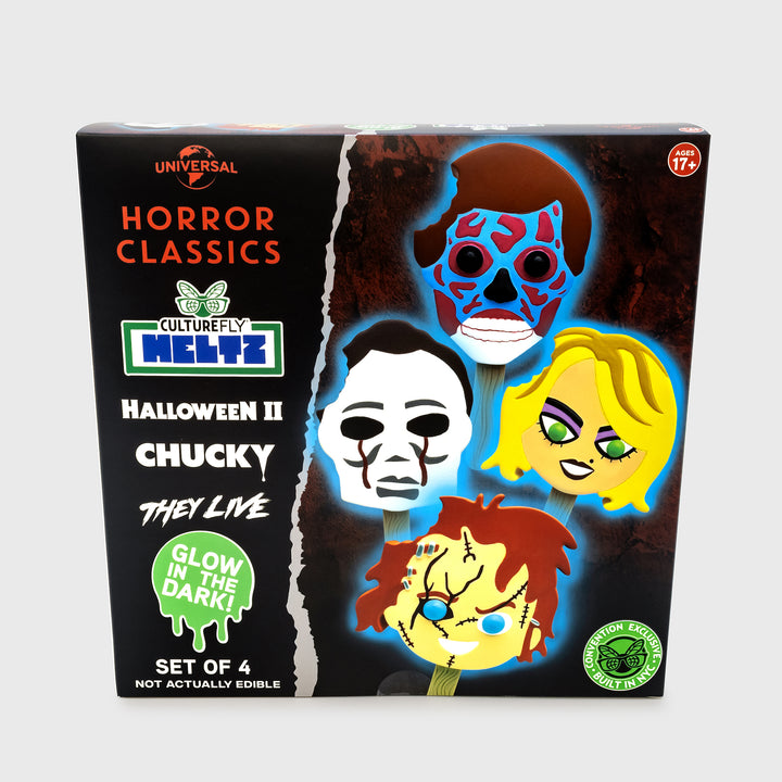 front of packaging: shows all 4 meltz. text: universal horror classics. culturefly meltz. halloween II. chucky. they live. glow in the dark. set of 4 not actually edible. ages 17+ convention exclusive build in nyc.