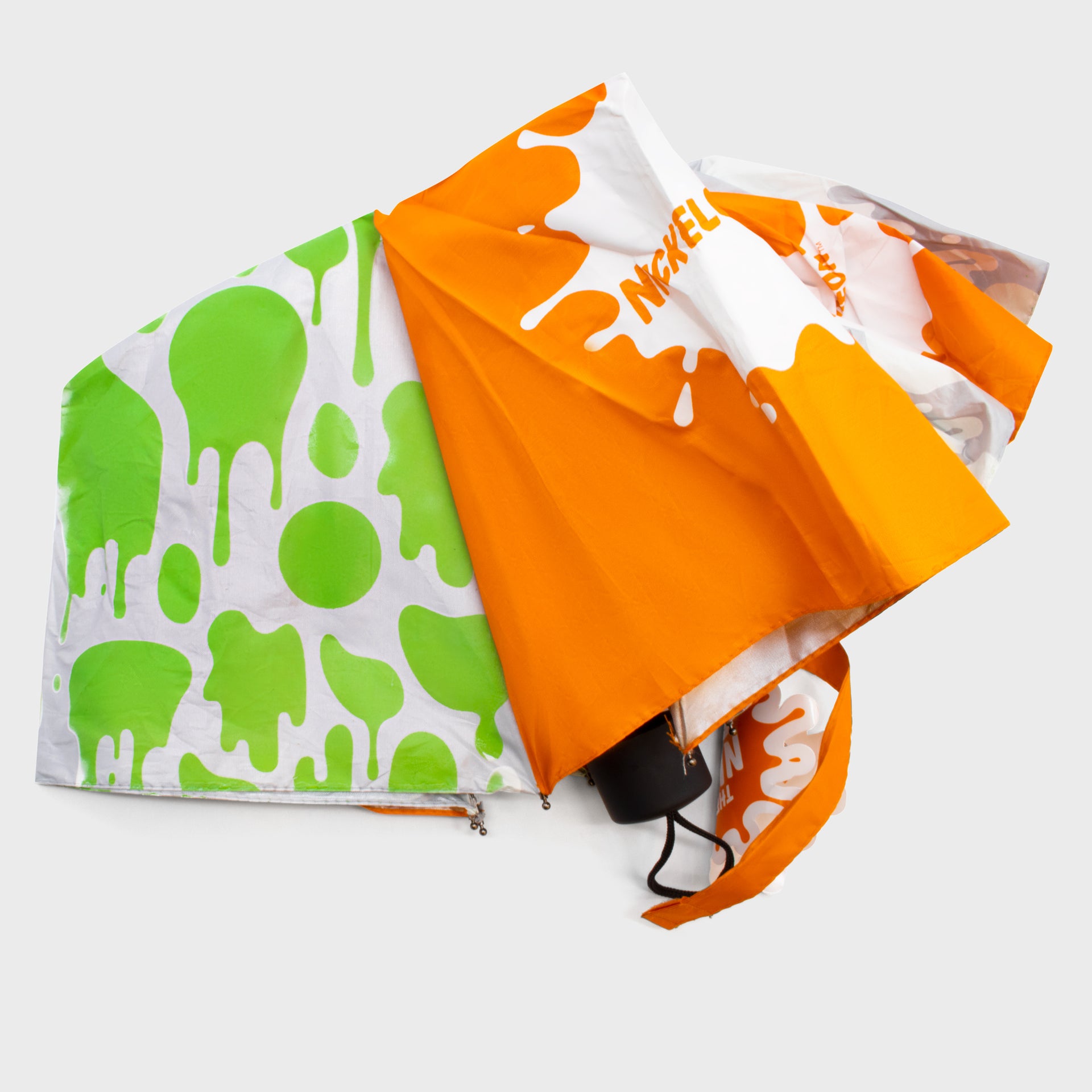 nickelodeon umbrella. orange nickelodeon splat logo. slime droplets.