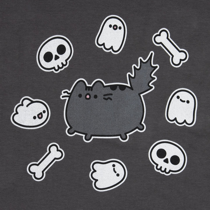 image on shirt: scaredy cat pusheen scared with bushy tall in the middle of a circle of ghosts, bones, and skeletons.