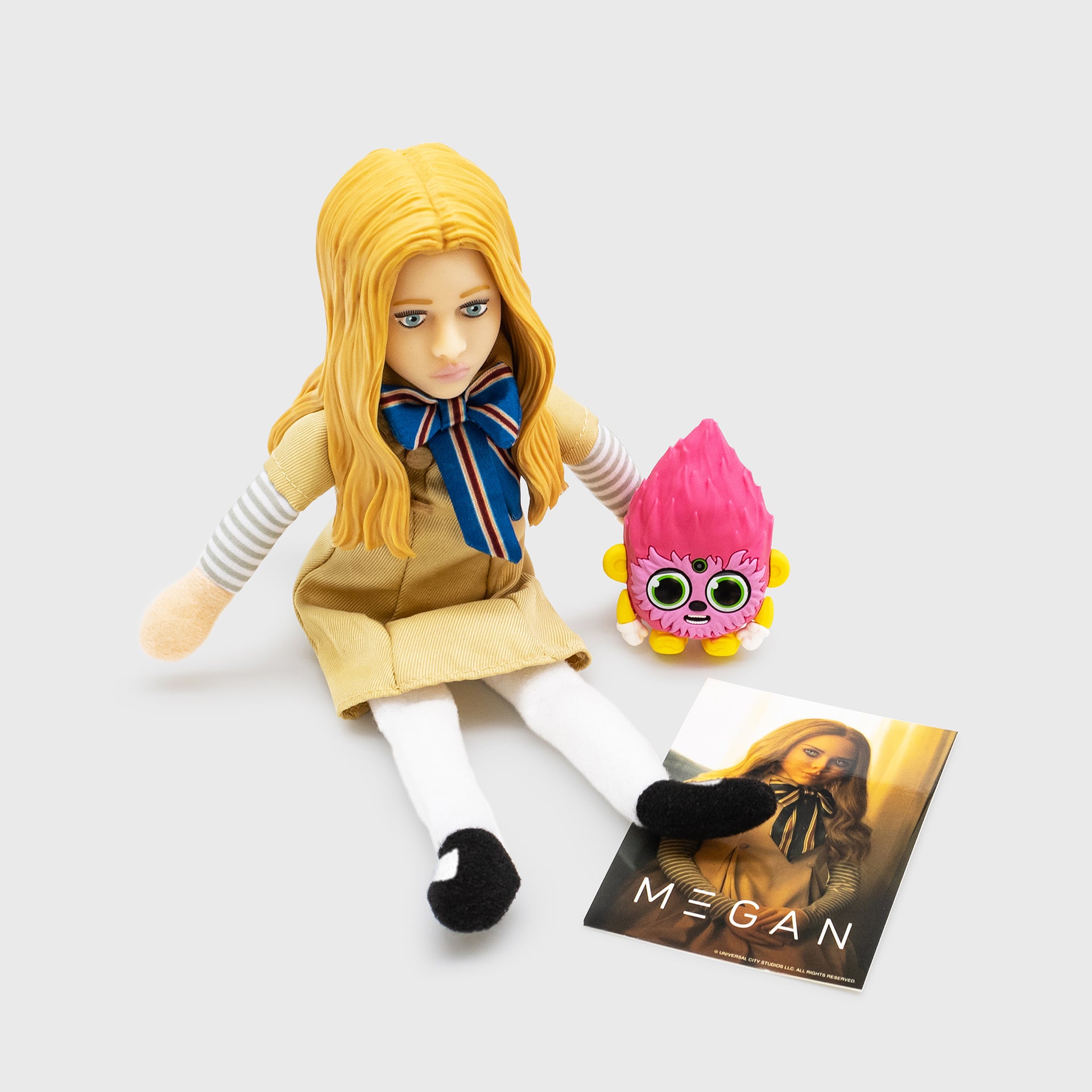 megan doll with accessory and mini poster