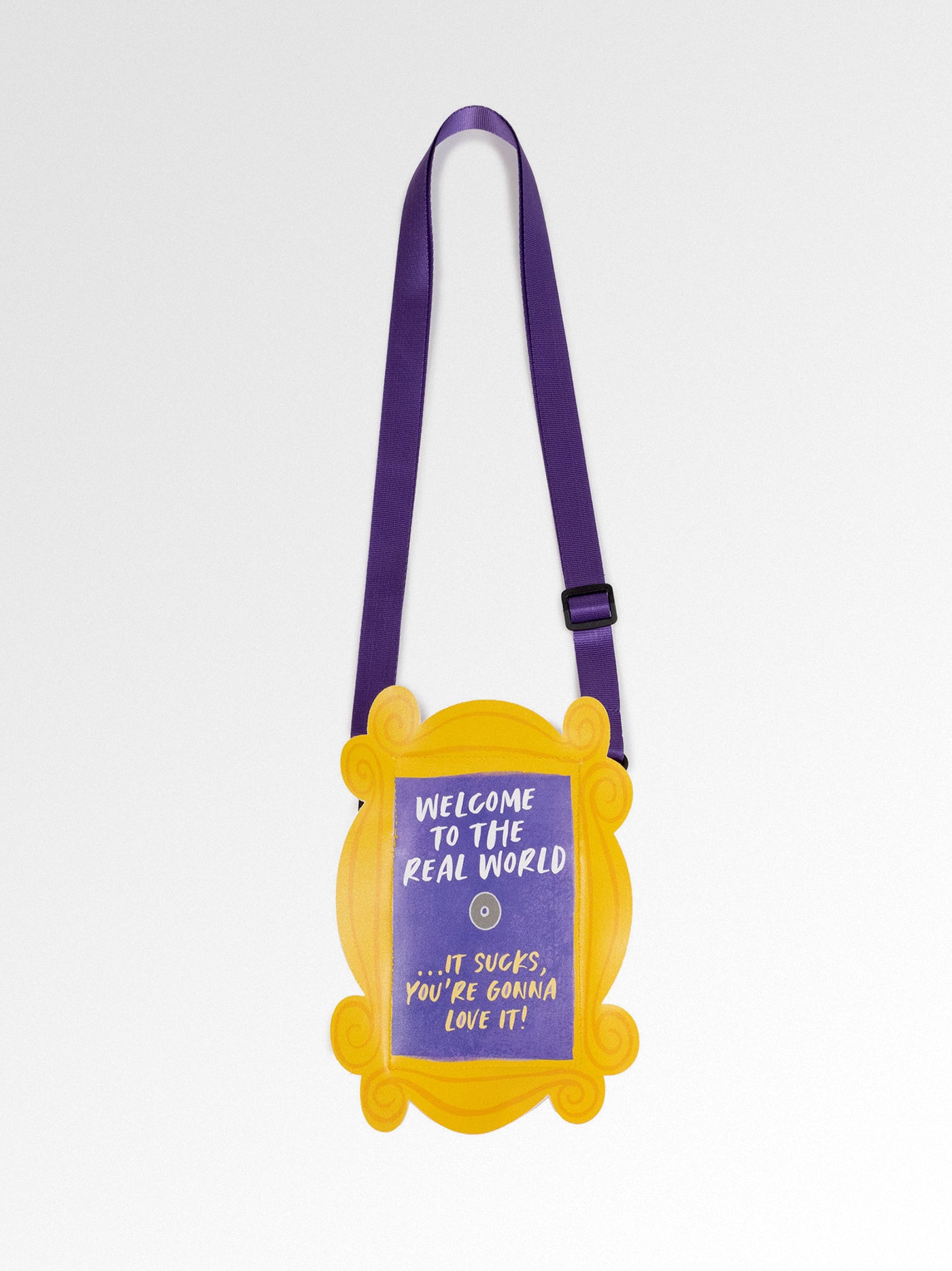 crossbody phone bag. in the shape of door frame. text: welcome to the real world...it sucks, you're gonna love it!