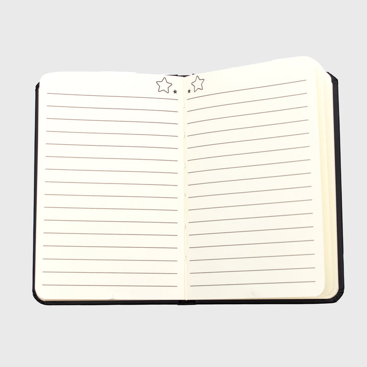 inside of notebook. lined paper with stars on top.
