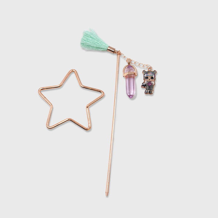 lol surprise hair accessory of star and wand. wand has a tassel on end with crystal and lol surprise doll charm.