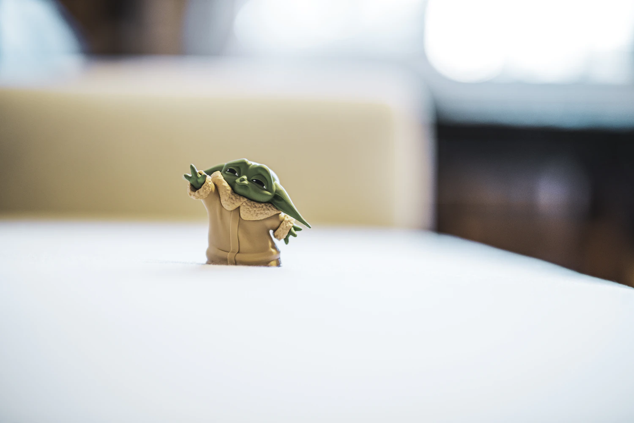 baby yoda figure on a table