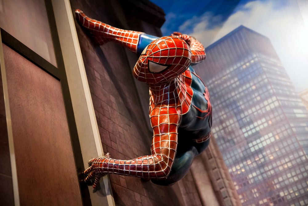 Spider man cling to the wall