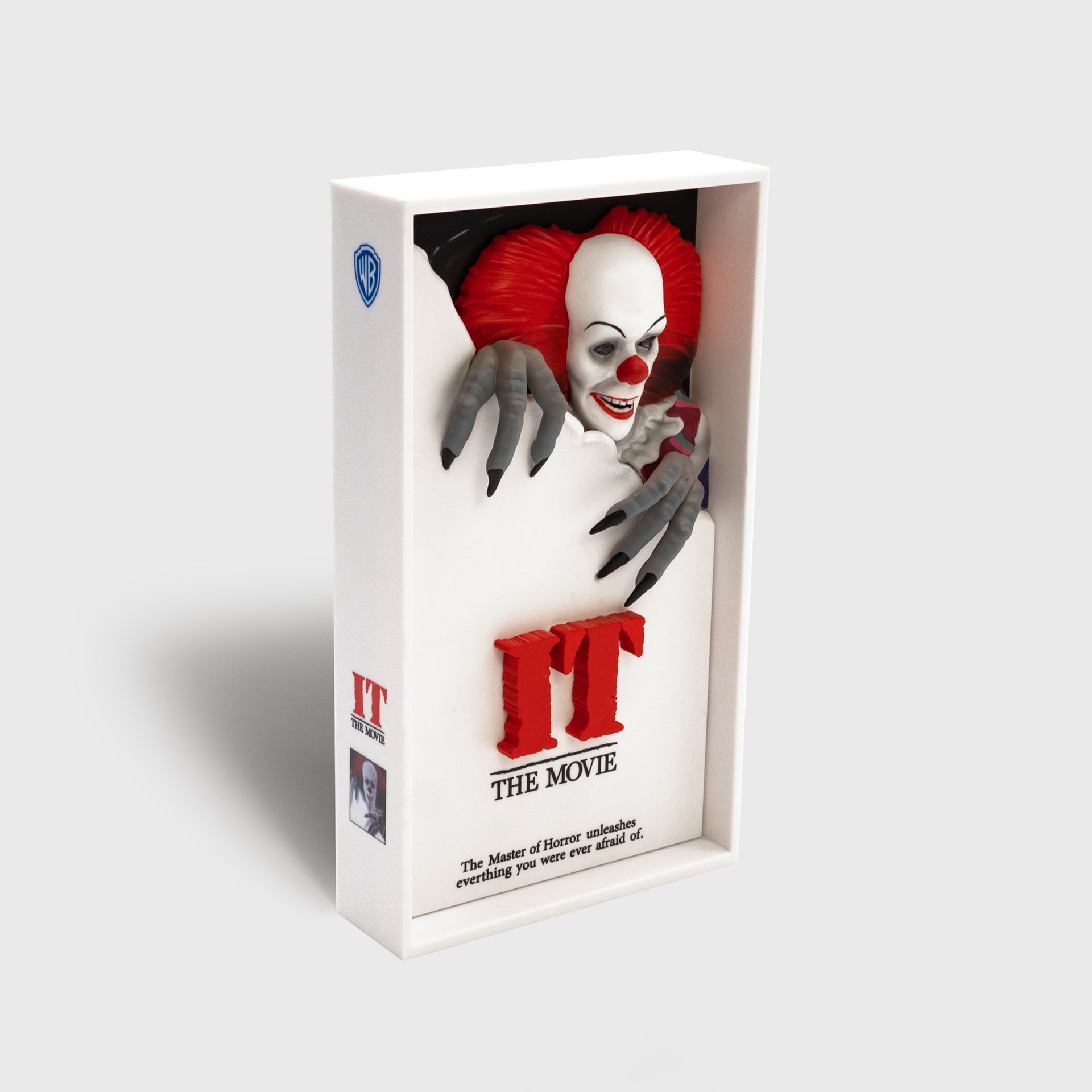 3Deep pennywise it collectible. text: it the movie the master of horror unleashes everything you were ever afraid of. image: pennywise coming out of figure