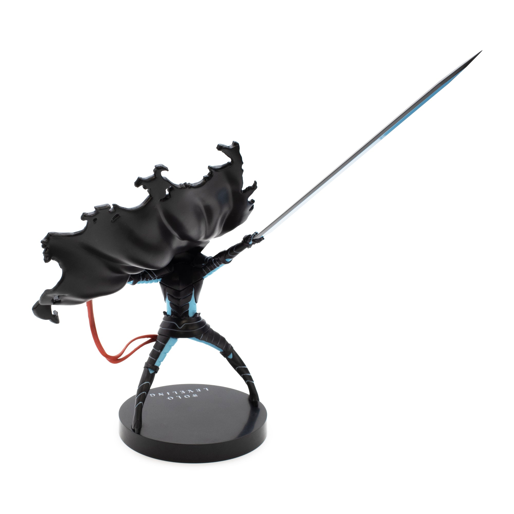 Black superhero figurine with cape and sword on a white background