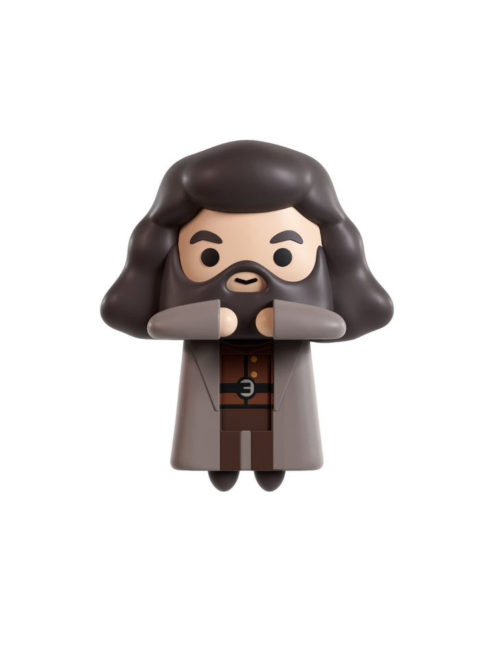A stylized collectible figurine of a wizard with long dark brown hair, a matching beard, and a brown robe, shown against a plain white background.