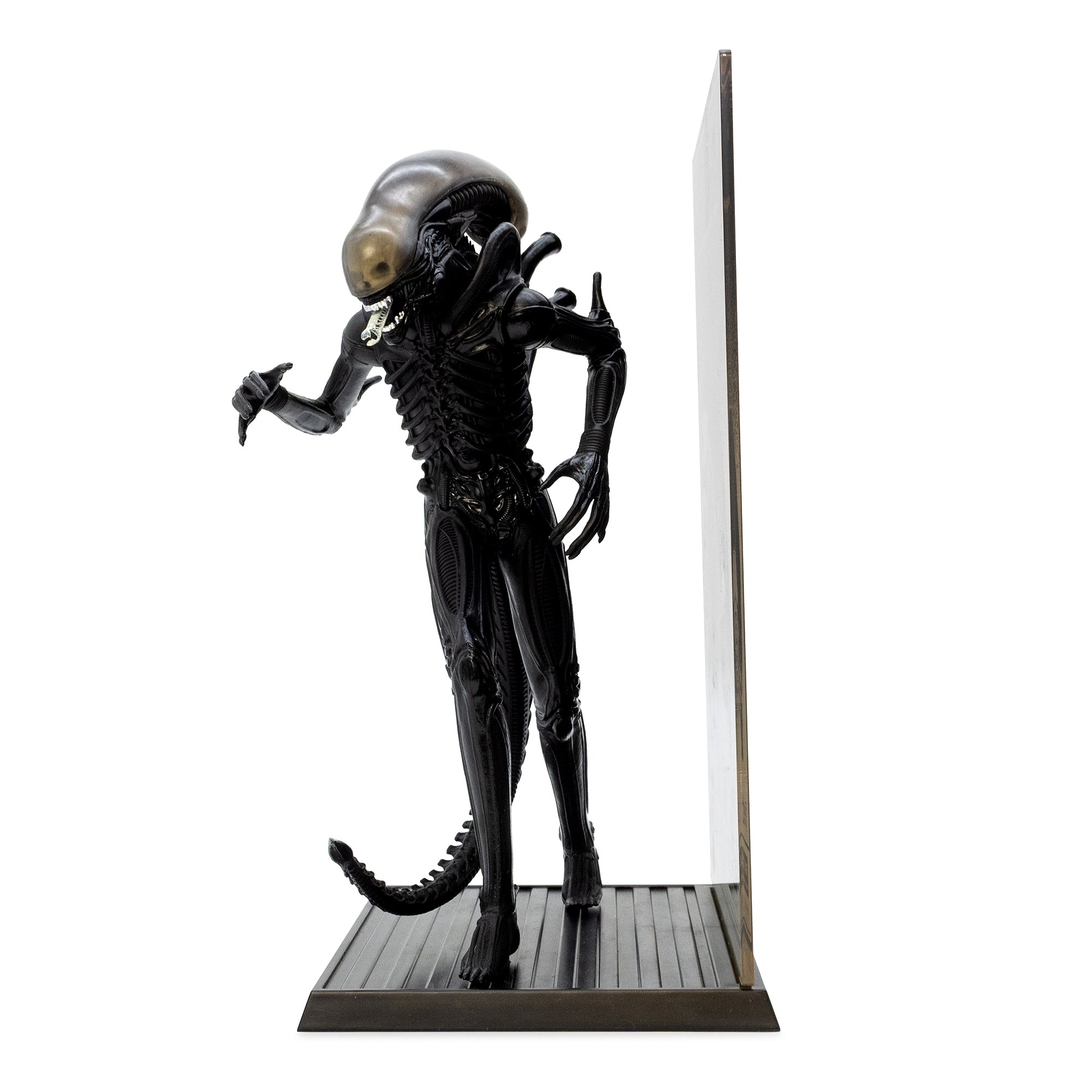 Alien figurine with a white background