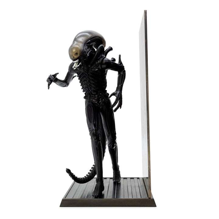 Alien figurine with a white background