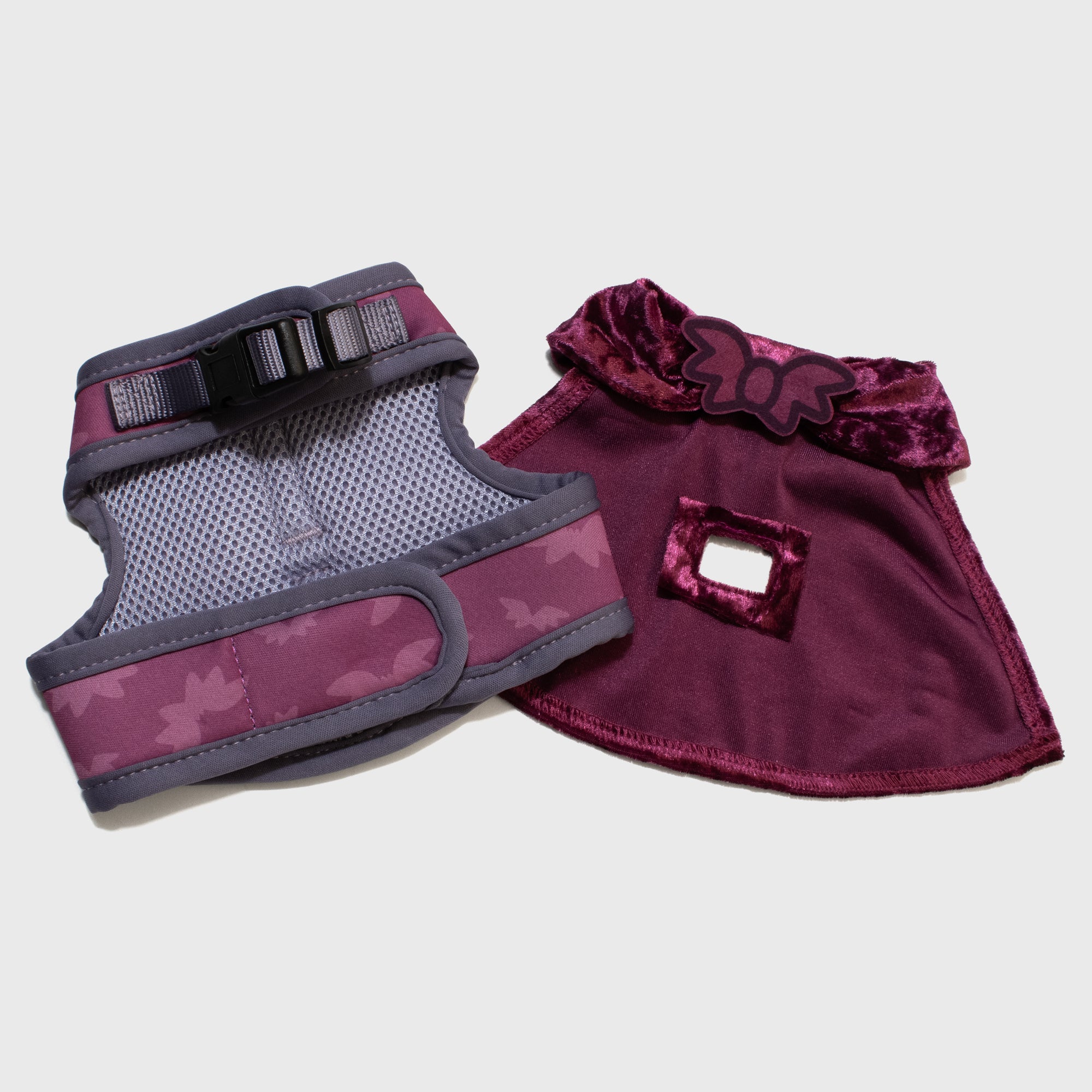bottom of vampurr vampire harness and cape. velcro strap and buckle on harness. little bat "bow tie" on cape.