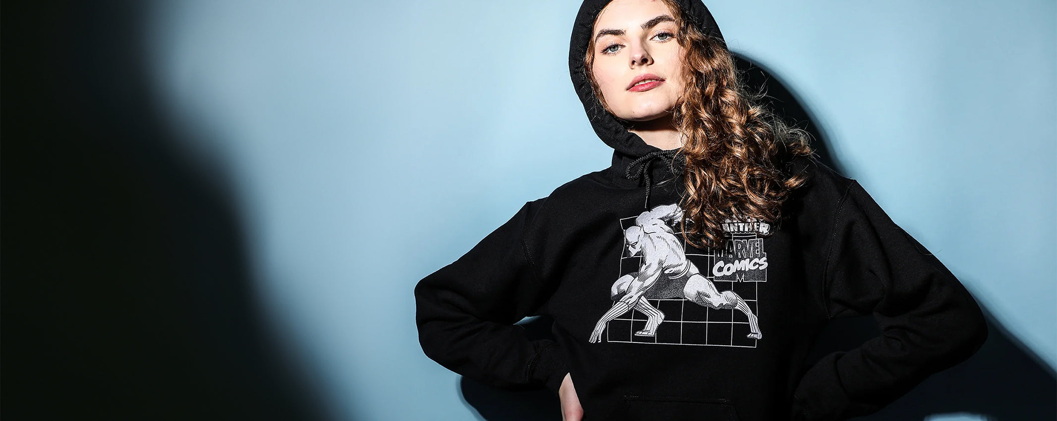 woman wearing black panther hoodie