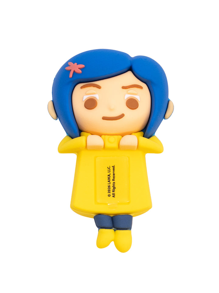 A cartoon-style character figure with bright blue hair, a pink dragonfly hair clip, a yellow top, and blue pants, shown on a plain white background.