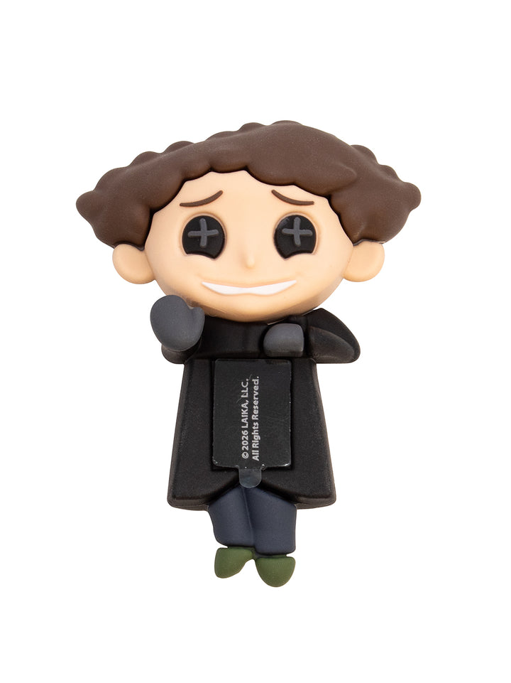 A stylized chibi figurine of a man with brown curly hair, wearing a black trench coat, dark blue pants, and green shoes, shown against a plain white background.