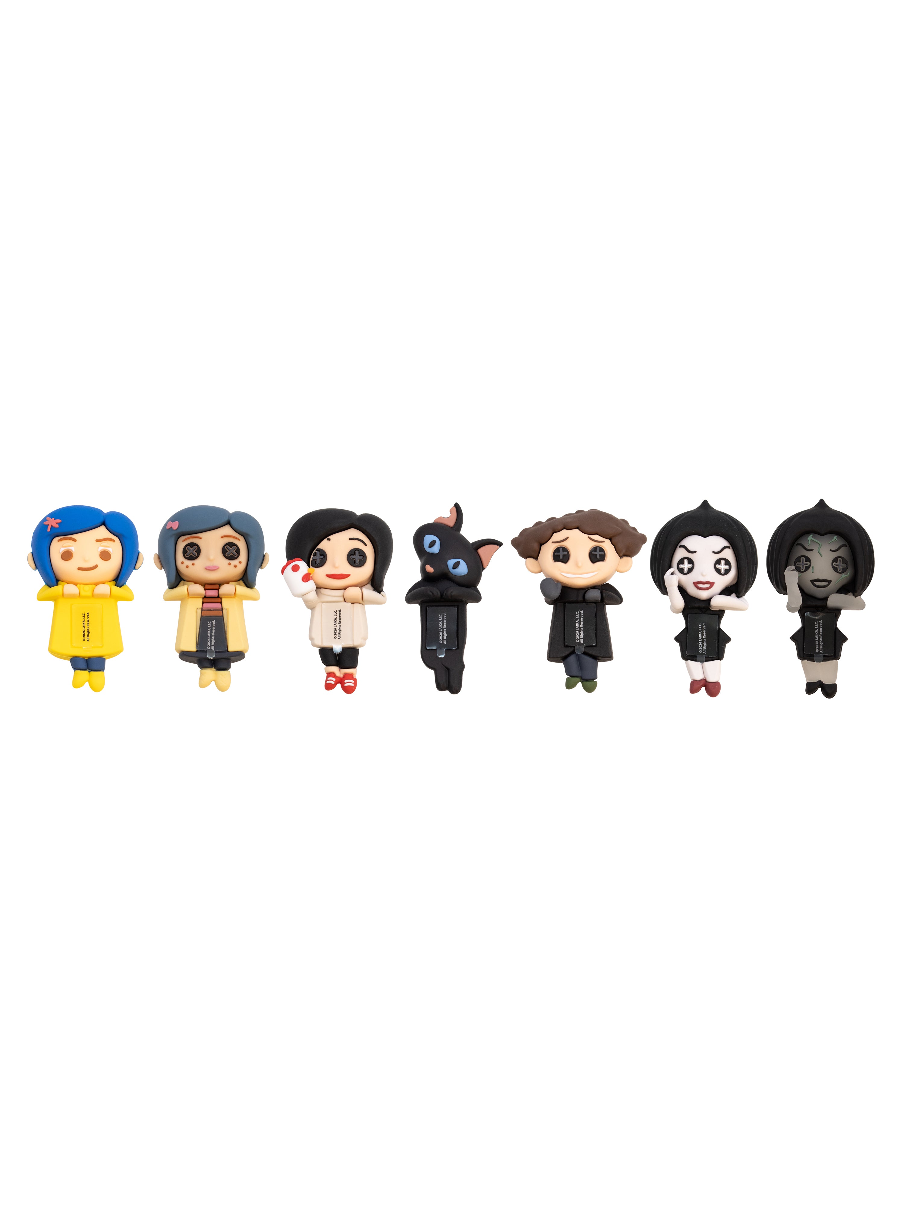 A row of seven small character figurines or collectible toys on a plain white background. The characters have stylized cartoon faces and wear varied clothing in yellow, black, white, brown, and blue.