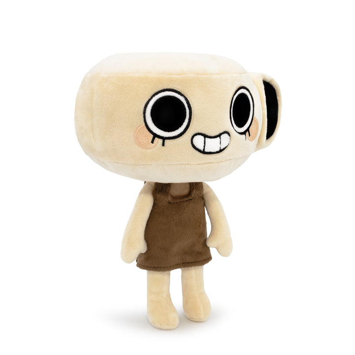 shelly plush side view. cartoon plushie with brown shirt on. head shaped like a shell. smiling face.