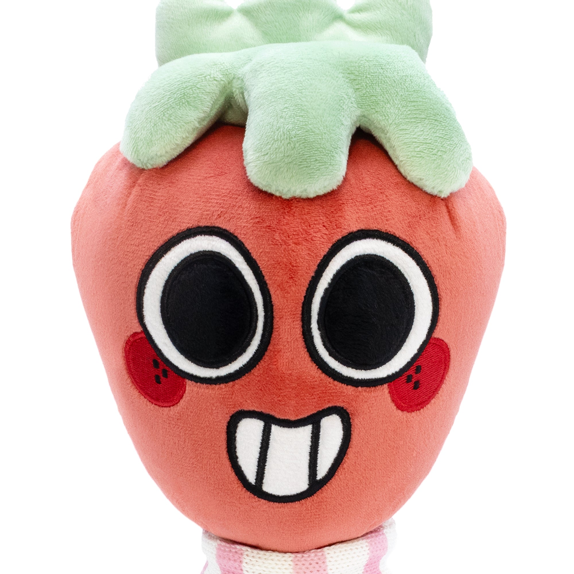 Plush toy resembling a strawberry with a happy face on a white background