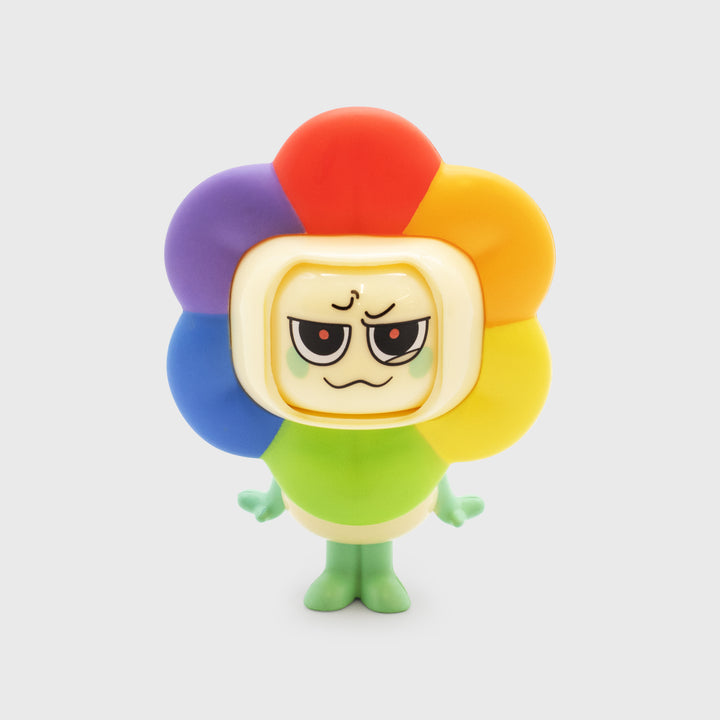 Colorful toy figure with a square face and round body on a white background