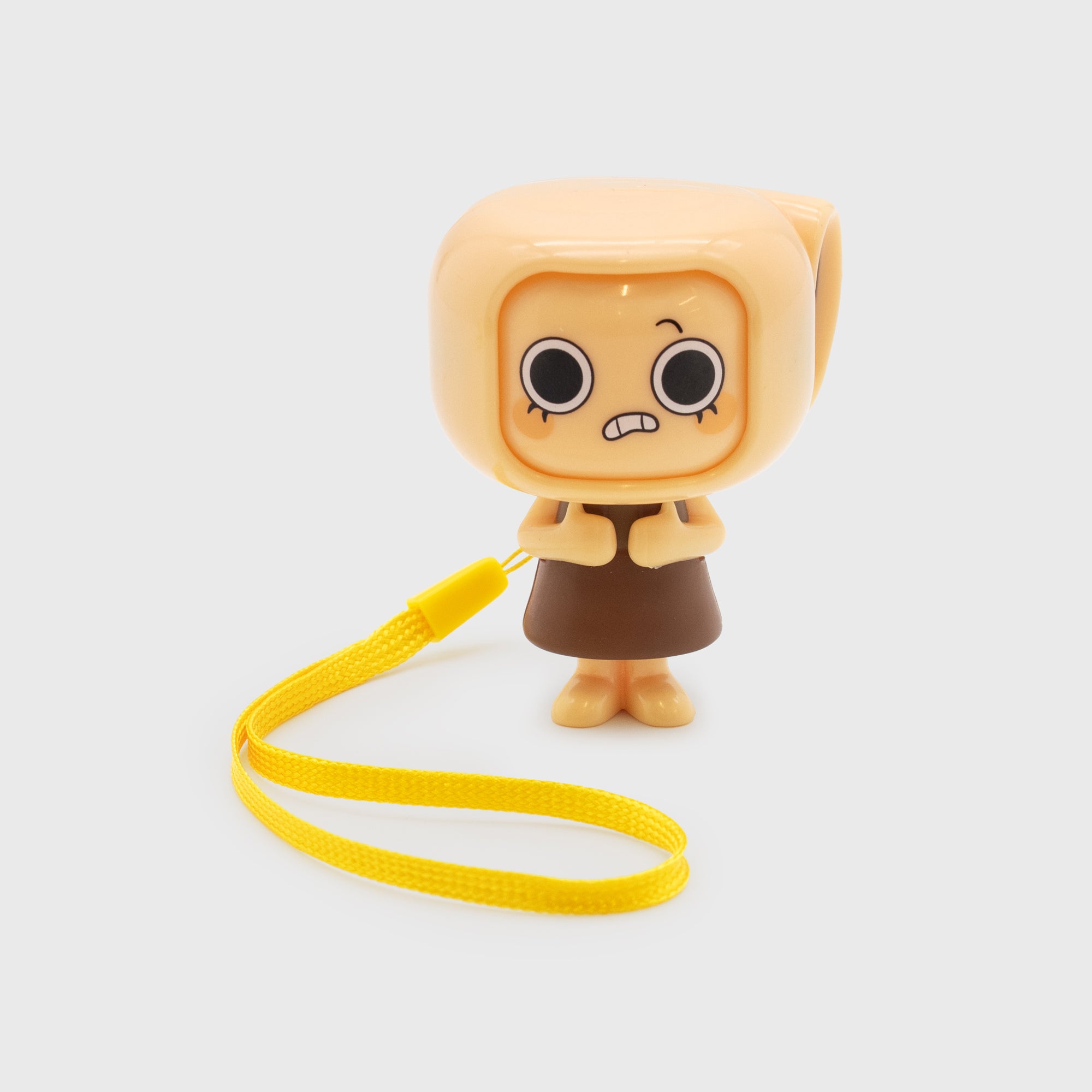 Toy figure with a yellow strap on a light gray background