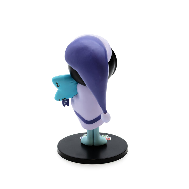Animated character figurine with a purple night cap and blue outfit on a white background