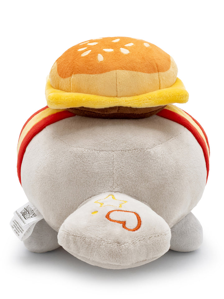 Pebble plush with cheese burger on his head and bottom. facing back. tail has heart and star on it.