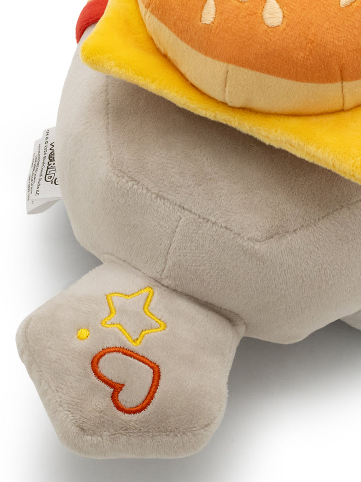 Pebble plush with cheese burger on his head and bottom. close up of tail with star and heart