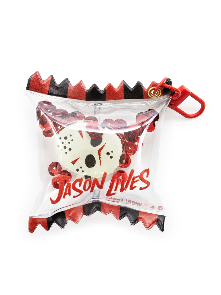 keychain that looks like a chip bag with jason lives written on it with hockey mask charm and red glitter inside