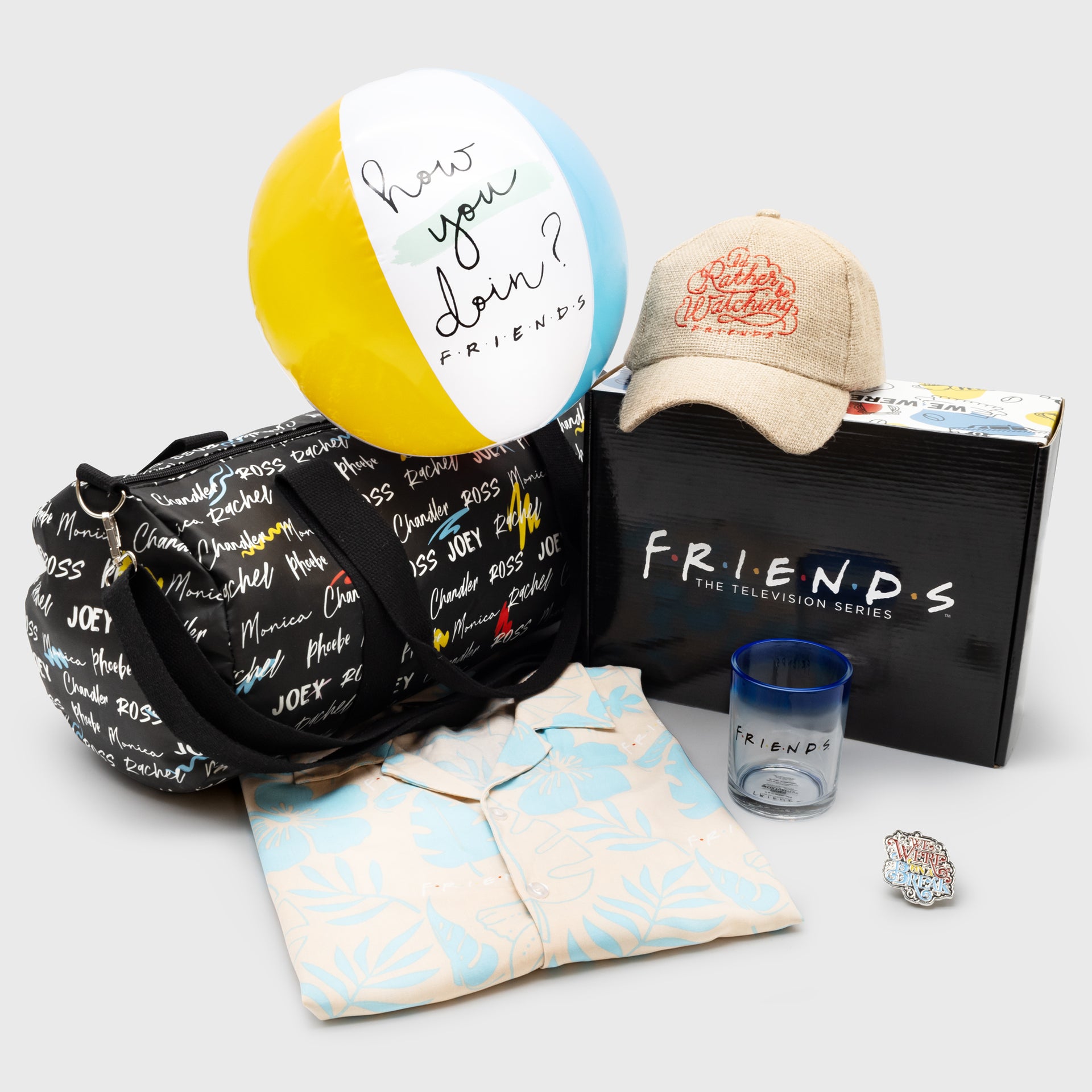 friends box full reveal. button down tee, hat, beach ball, weekender bag, glass, pin
