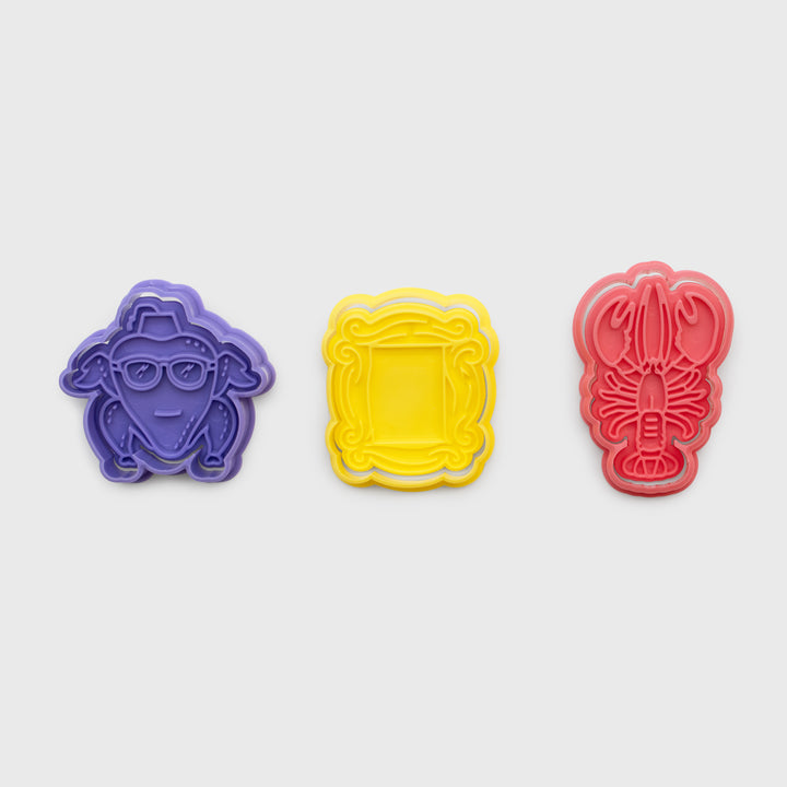 3 cookie cutters. turkey head, picture frame, lobster
