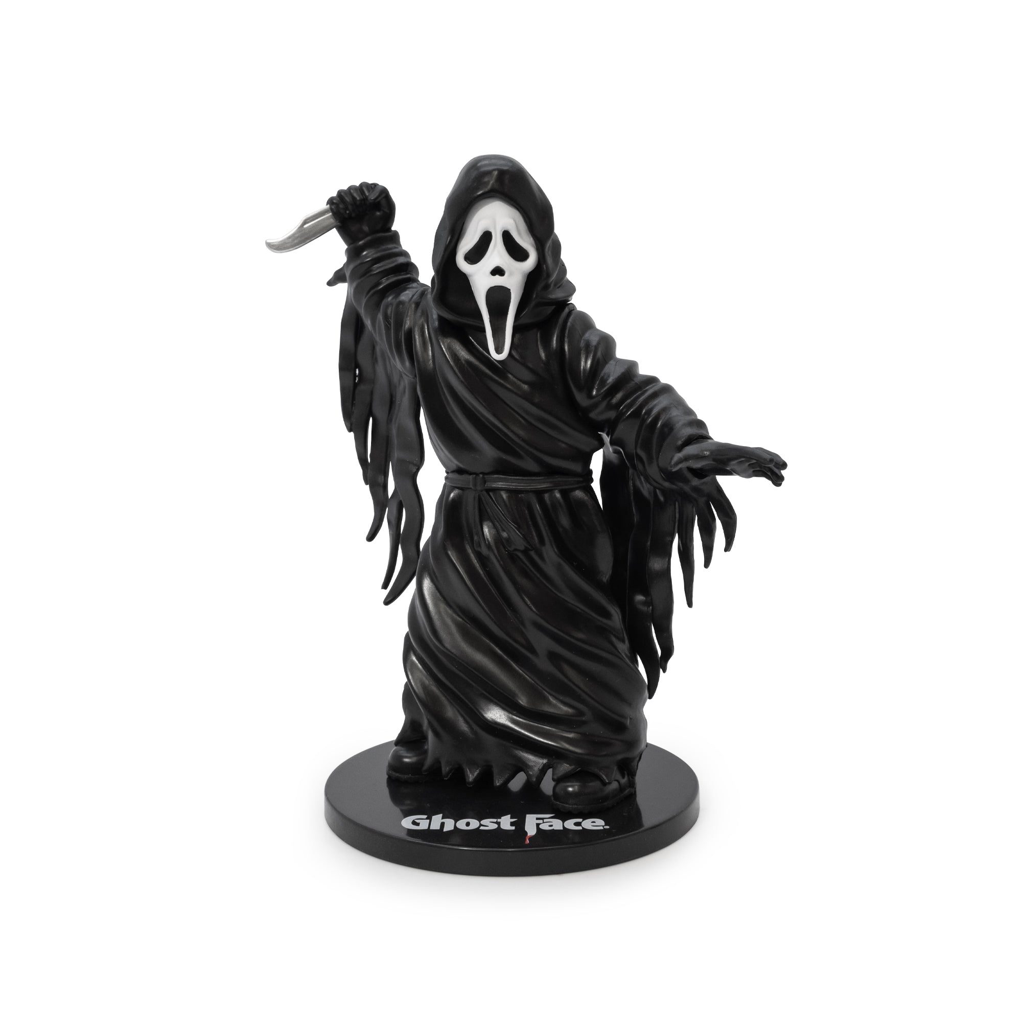 ghostface figure holding knife raised on stand