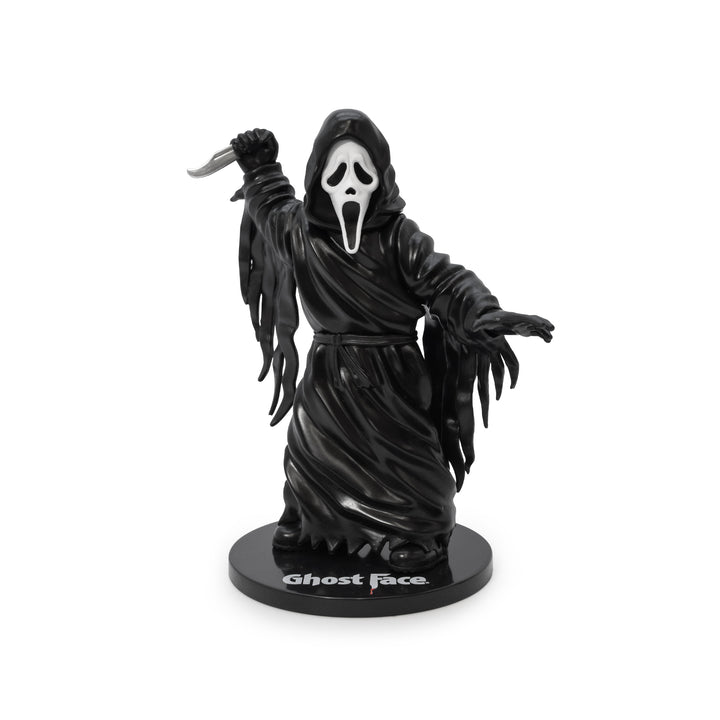 ghostface figure holding knife raised on stand