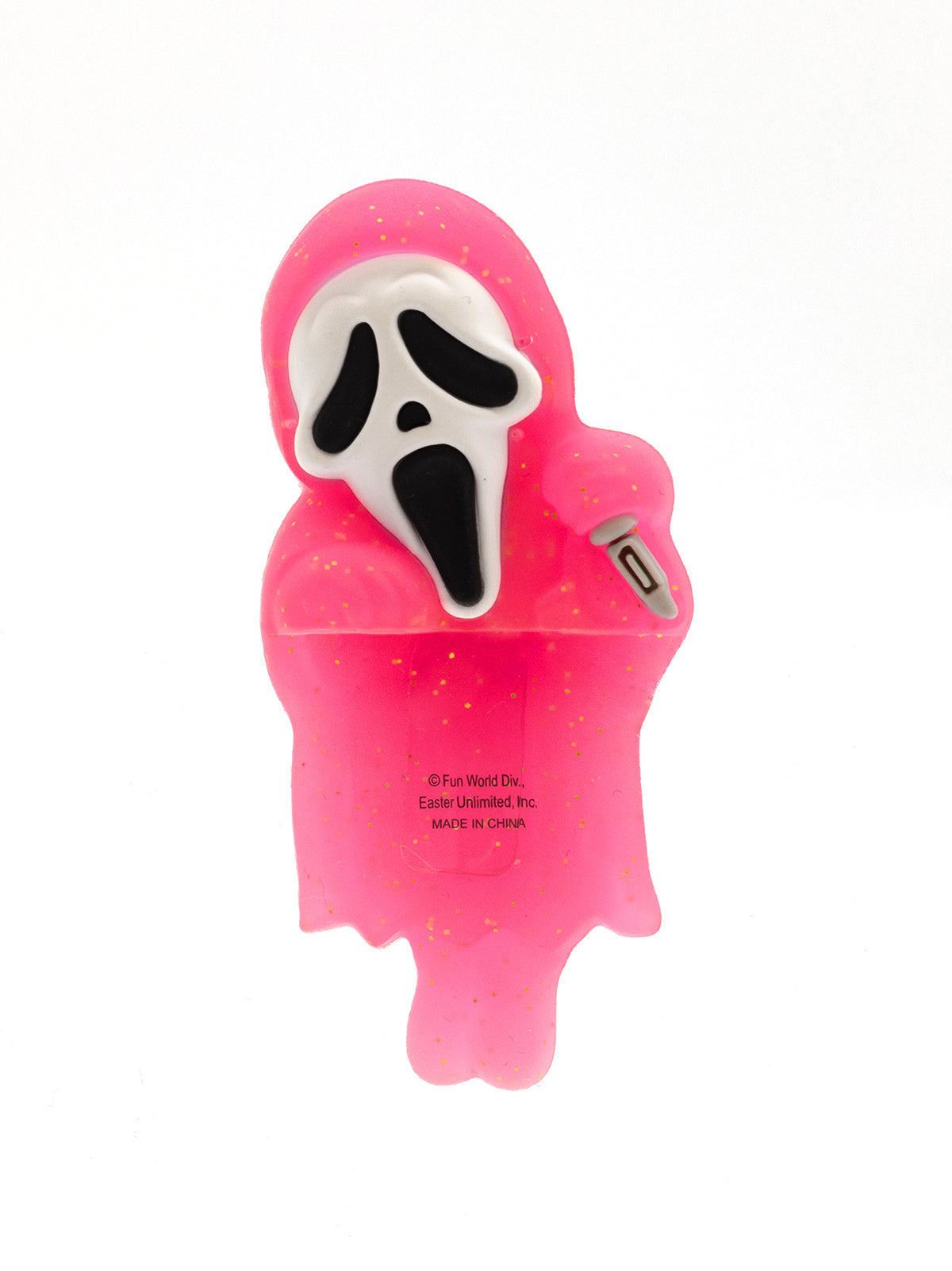Pink ghost-shaped device with a white face design on a white background
