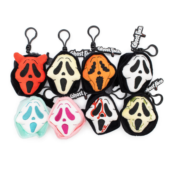 Set of Ghost Face keychains with various color variations on a white background