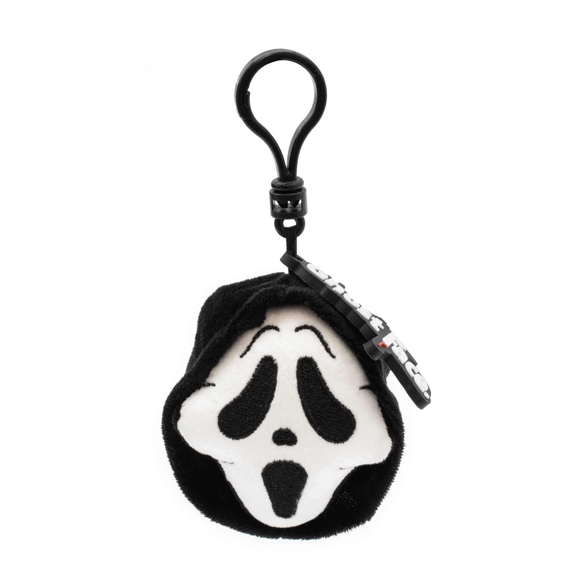 Keychain with a black and white face design on a white background
