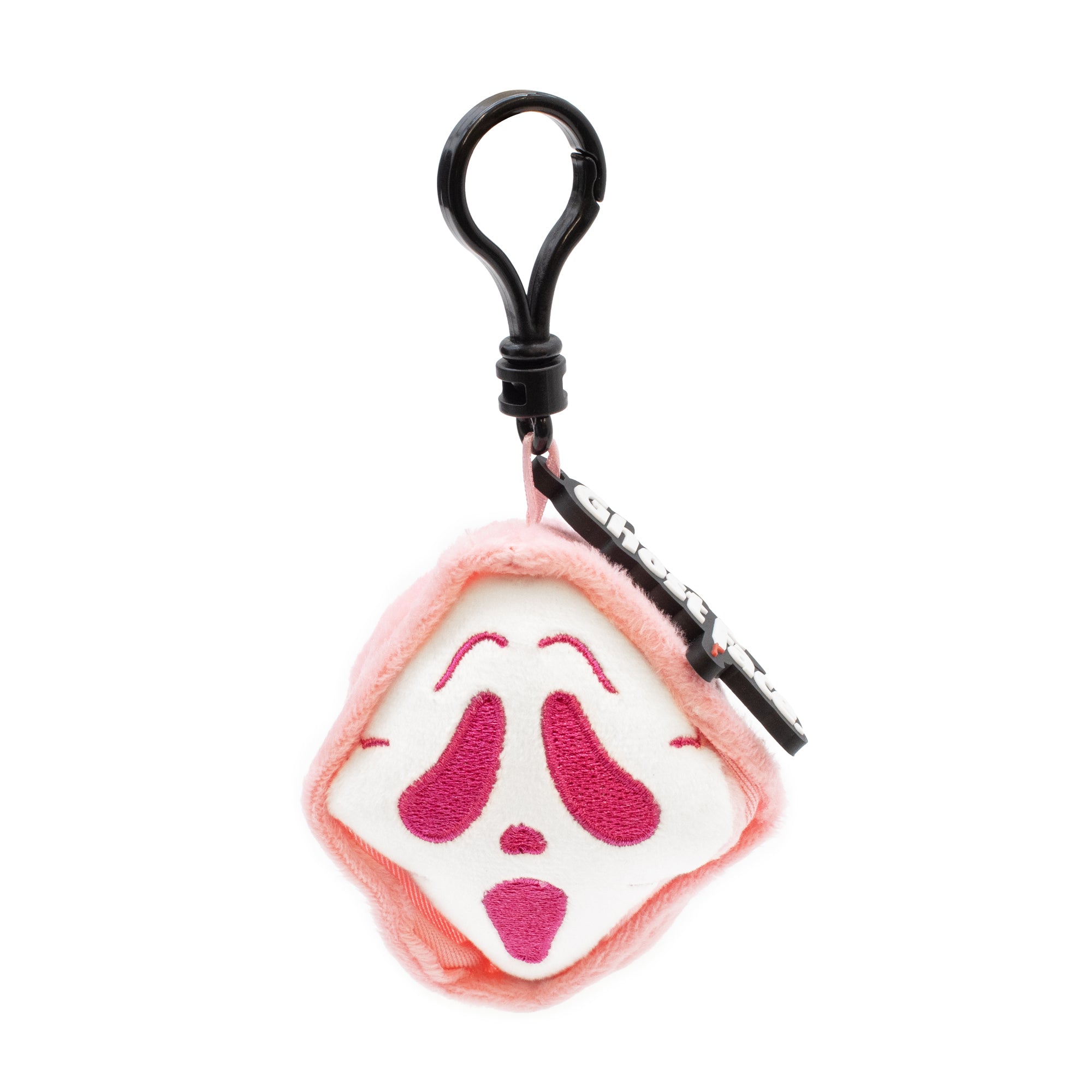 Plush keychain with a face design on a white background