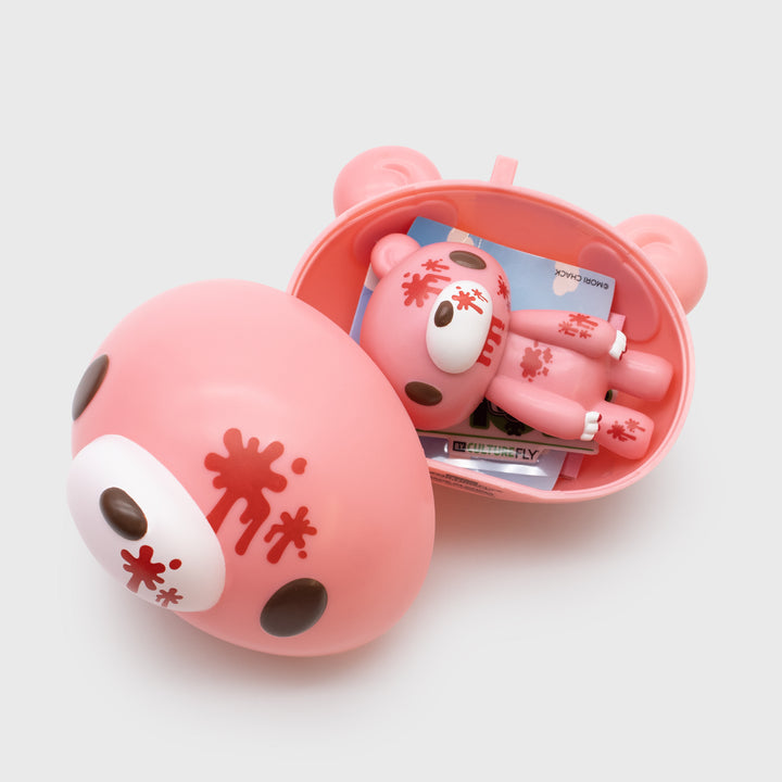 gloomy bear smols packaging. comes with smol figure, collection sheet, gloomy bear sticker, and culturefly smols sticker