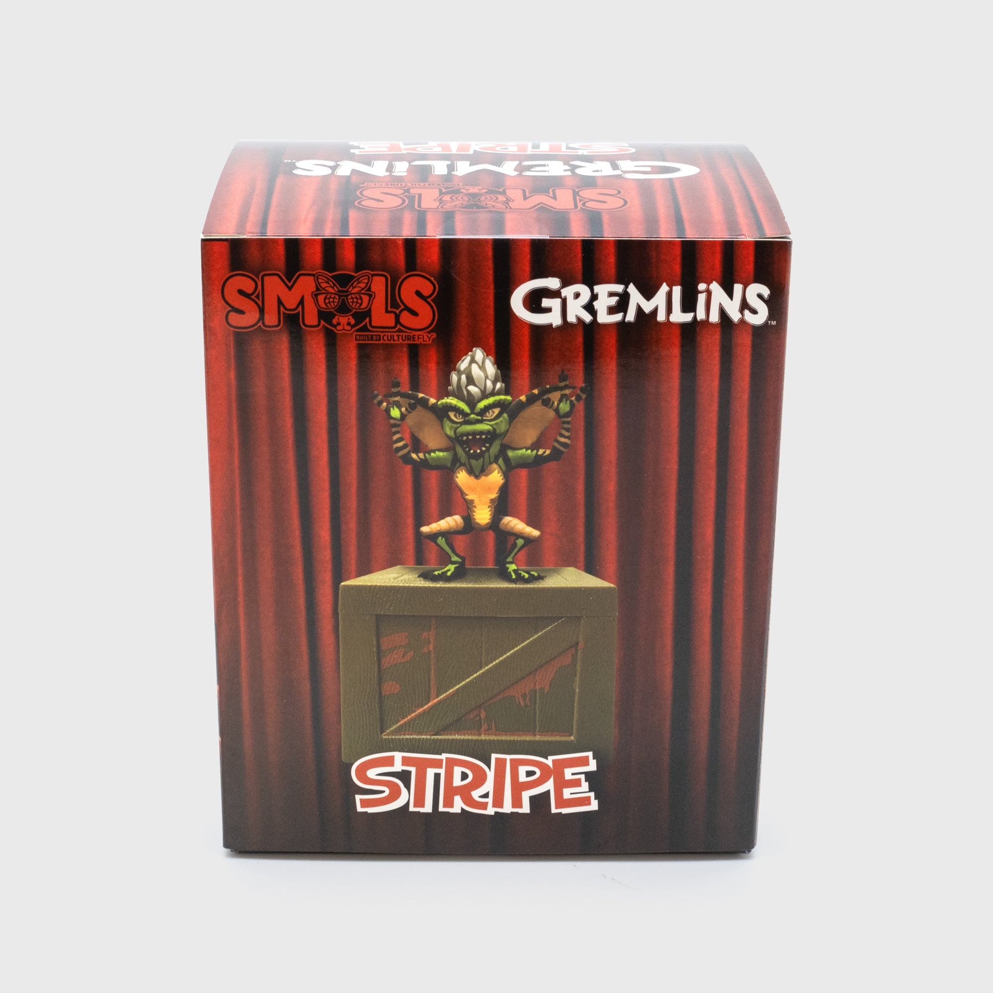 gremlins stripe smol side packaging. text: smols gremlins stripe
