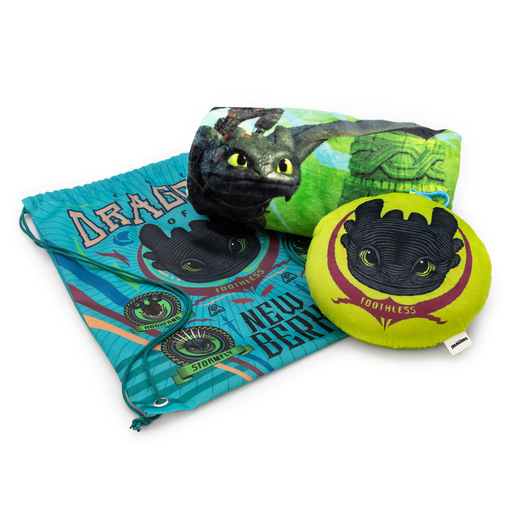 Plush toy and accessories featuring a dragon design on a white background