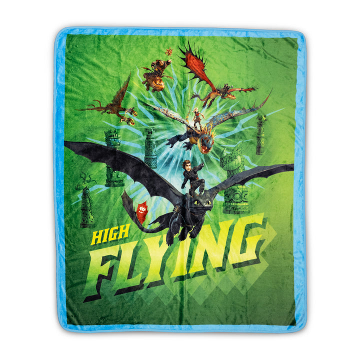 Blanket with dragon graphics and 'High Flying' text on a green background