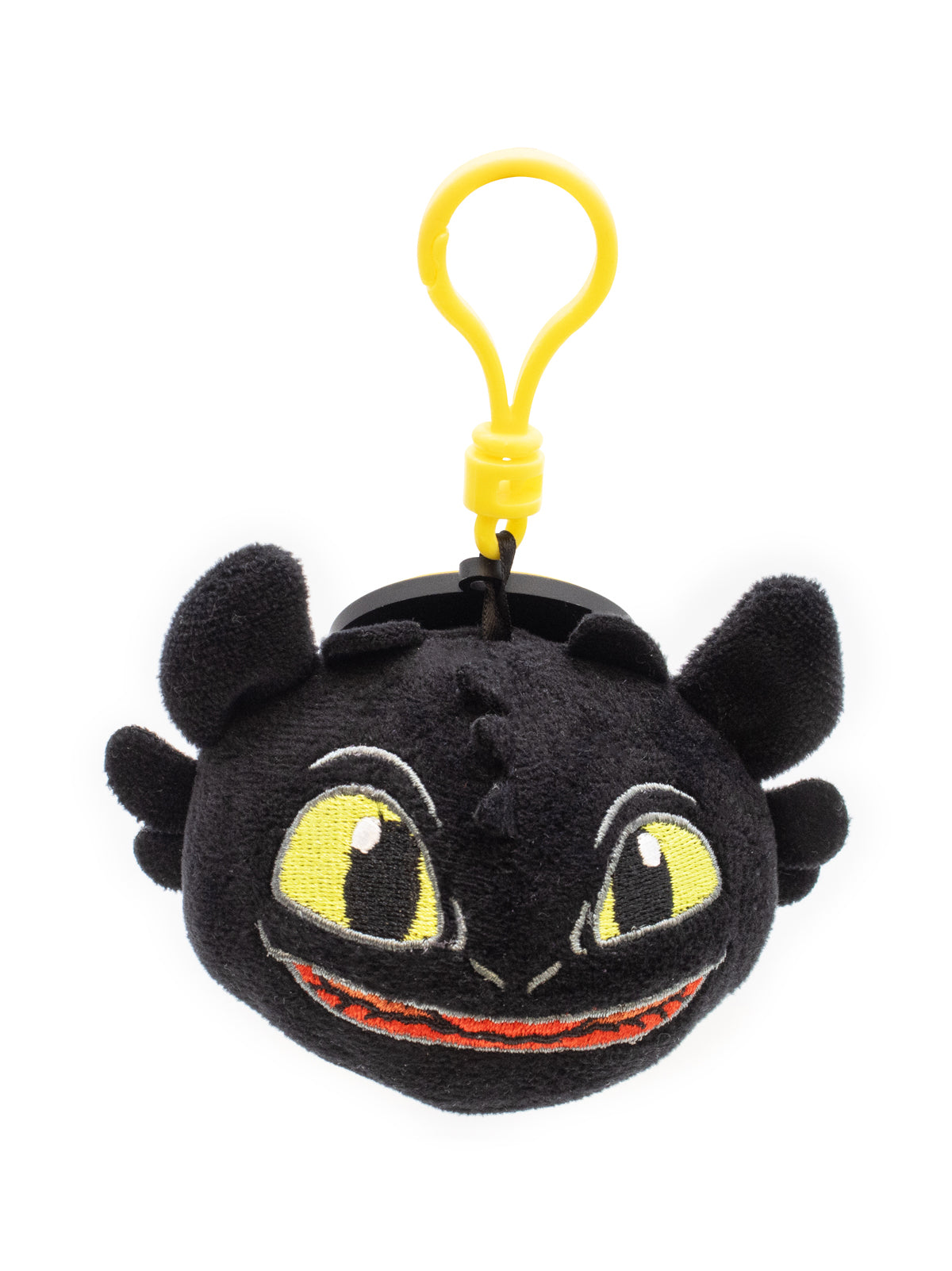 Plush keychain of a dragon character with yellow eyes and a black body on a white background.