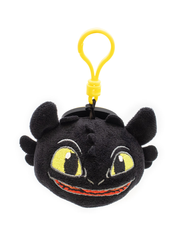 Plush keychain of a dragon character with yellow eyes and a black body on a white background.
