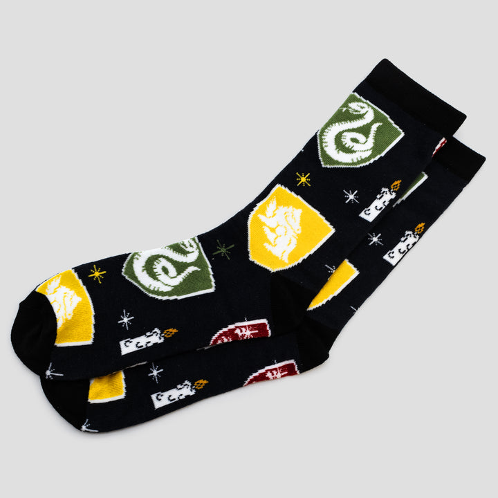 crew socks. image on socks: different house symbols. candles.