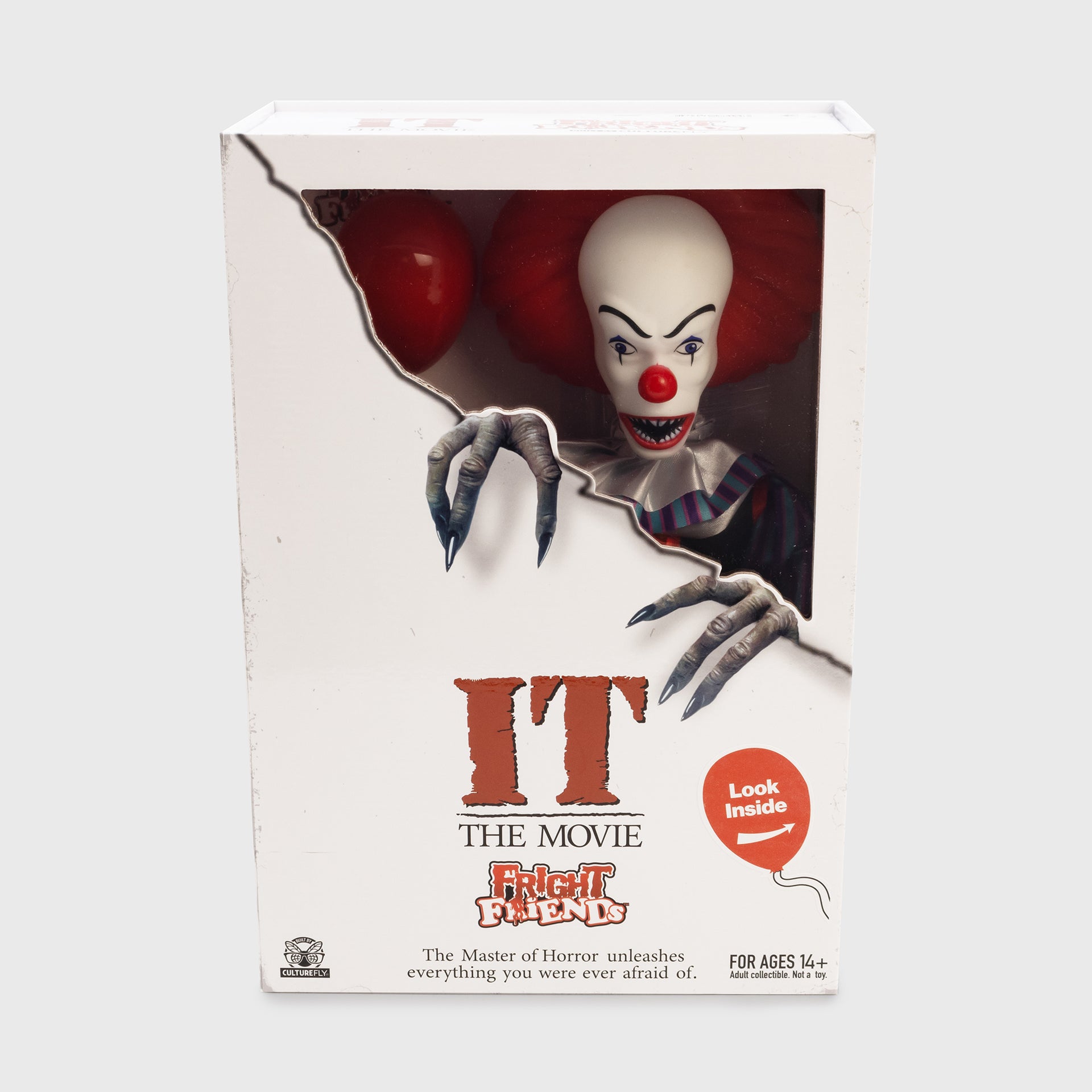 front of fright fiends it pennywise packaging. text: it the movie fight fiends. look inside. the master of horror unleashes everything you were ever afraid of. for ages 14+ adult collectible. not a toy. culturefly