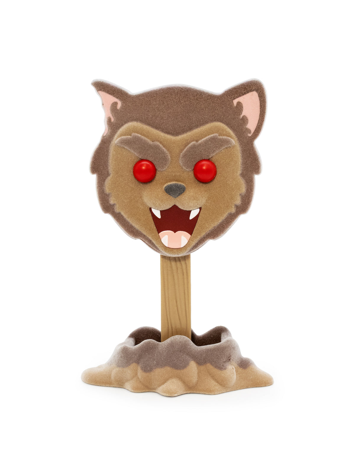 A felt werewolf head on a wooden stick, mounted in a brown and beige rocky base, photographed against a plain white background.