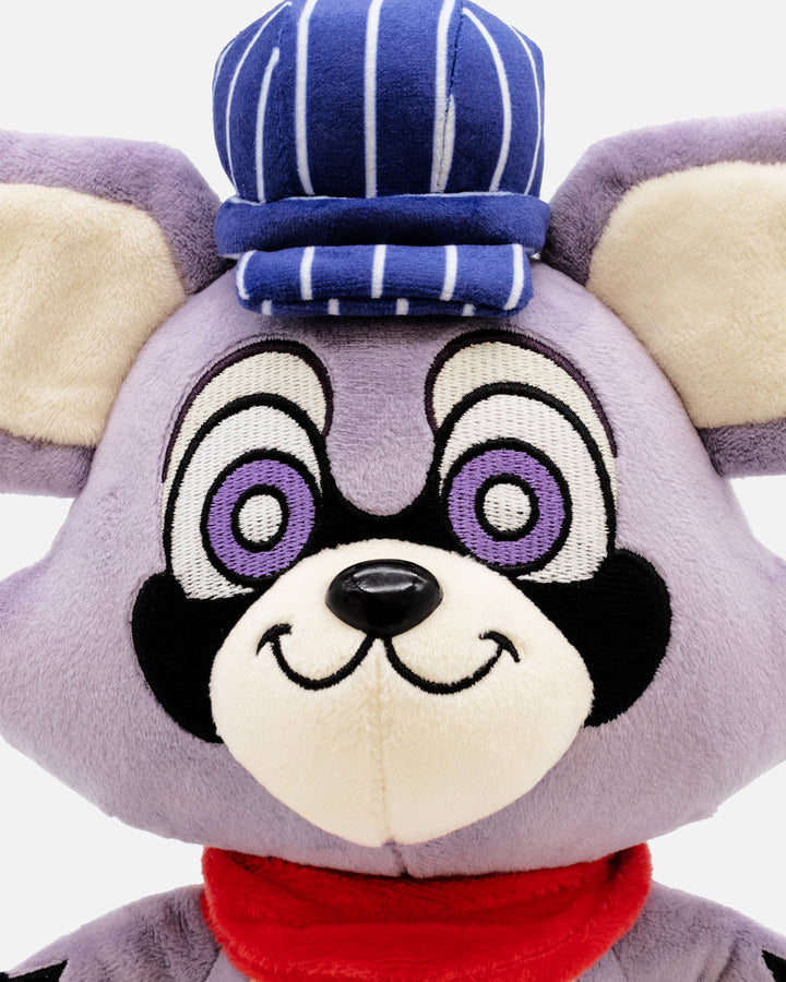 Plush toy with a gray face, purple eyes, and a blue and white striped hat on a white background
